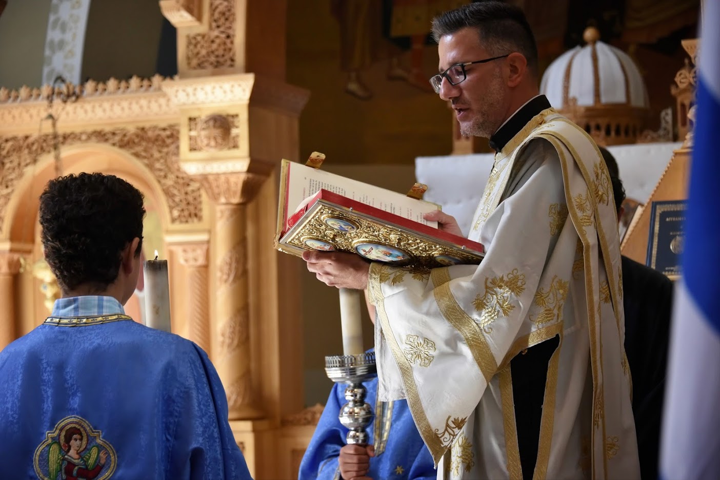 Reading the Holy Gospel